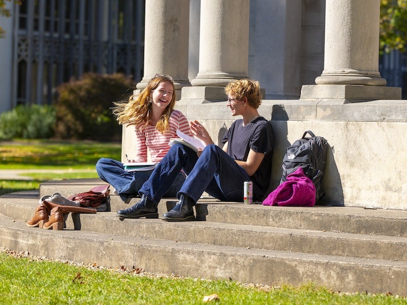 Students Relaxing at the Arch