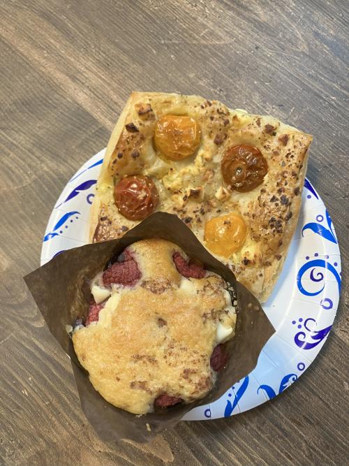 A raspberry muffin and tomato feta crossaint.