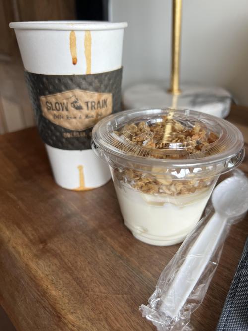 Yogurt cup and vanilla latte
