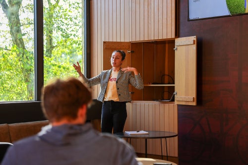 Jo Line leads classroom discussion on Sport, Society, and Power.