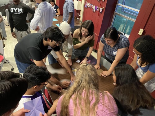 STRONG first-year scholars and senior peer-mentors collaborate on pre-orientation activities in Barnard Lounge