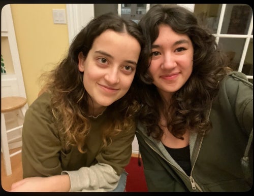 A selfie of smiling Elyssa and Kibriya