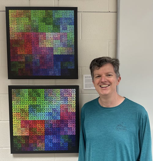 Kevin Woods with artwork