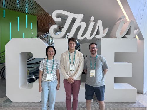 Group photo of alum and CS professor 
