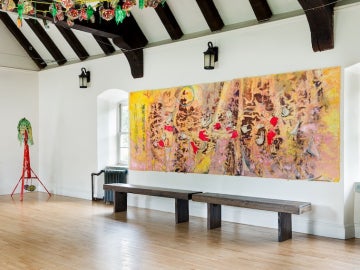 Large painting hanging on a wall