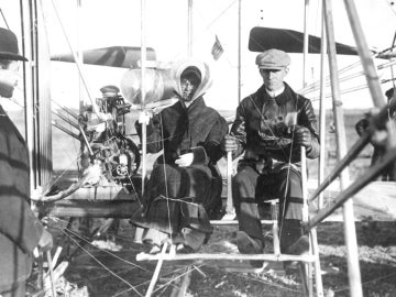 Katharine Wright sits in an airplane