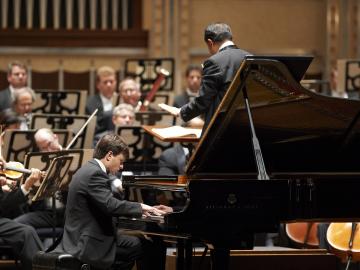 Pianist performs with orchestra