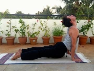 A man in a yoga pose