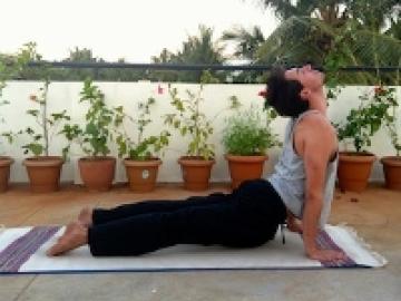 A man in a yoga pose