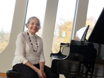 Dolores White '54 seated in Stull Recital Hall.