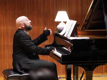 Pianist performing on stage