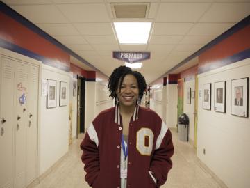 Amethyst Carey stands in the halls of Oberlin High School