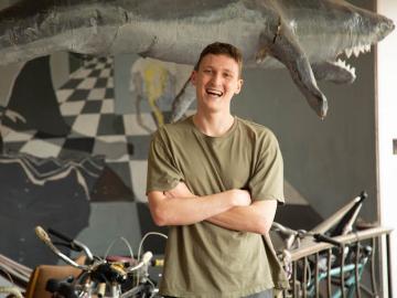 Picture of man standing with arms crossed