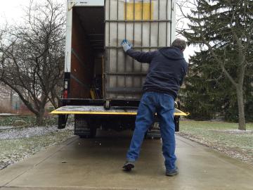 Loading letters onto the mail truck