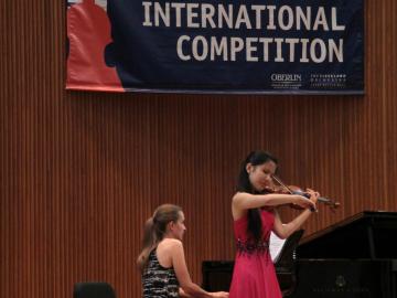 Angela Wee of New York performs in the Semifinal Round of the 2013 Cooper International Competition