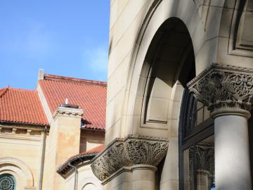 Closeup of stone arch and columns