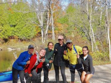 Outing Club students take a quick break from canoeing in Michigan