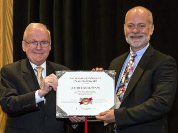 Frederick Haas receives an award