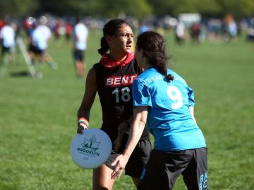 Action shot of Abbey Cheng playing ultimate