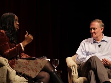 President Ambar and Dr. Hartle seated on stage