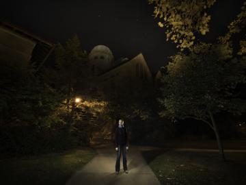 Jillian Scudder in front of Peters Hall