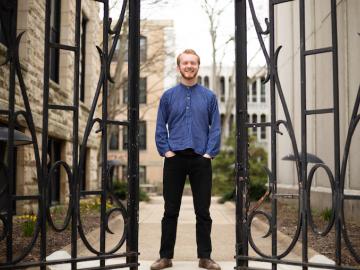 Picture of man standing in courtyard