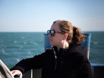 Julia Christensen standing on the ferry to South Bass Island