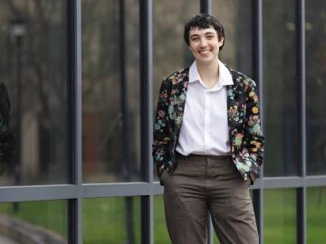 Person smiling at camera.