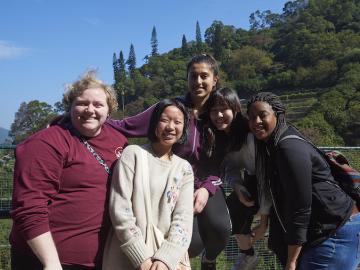 Five students pose at the Kadoori Farm and Botanic Garden in Hong Kong