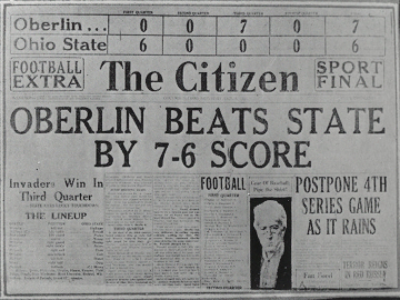 newspaper front page with football score.
