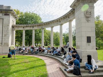 Class being taught outside at Oberlin's Memorial Arch.