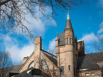 Exterior of 1880s Sandstone Building with tower and steeple