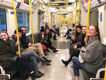 Students traveling via tube in London