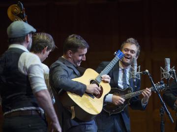 bluegrass musicians on stage.