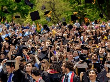 New Oberlin graduates celebrate at the conclusion of their commencement ceremony.