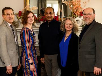 Faculty honorees pose for a photo at the home of President Ambar.