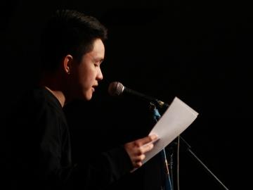 Spoken word artist Troy Osaki performs at the Cat in the Cream