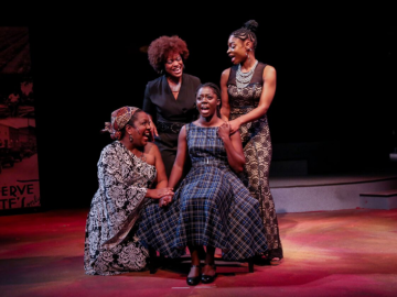 Four women singing on stage at Karamu House in a production of Simply Simone