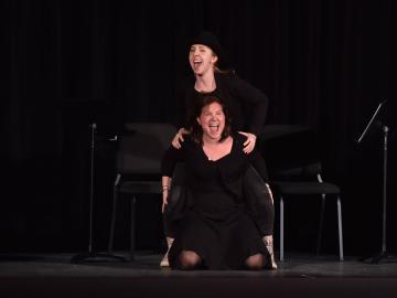 Two performers on stage