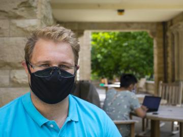 A portrait of a student wearing a mask.