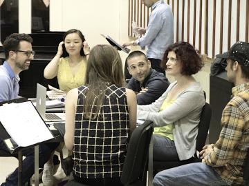 Composer Rachel J. Peters with 7 members of the workshop cast and crew of her opera The Wild Beast of the Bungalow.