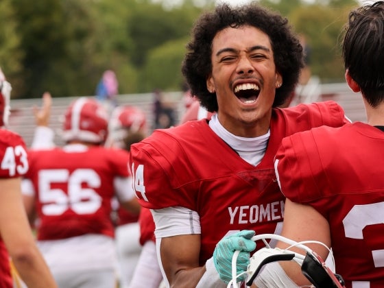 Football player smiles at game