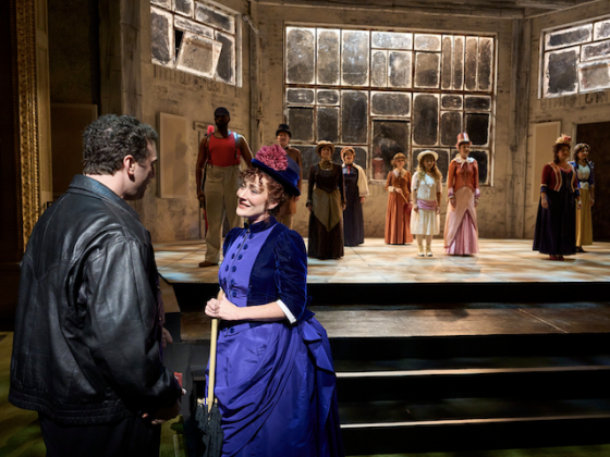 performers on stage in a musical.