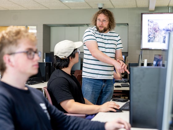 Adam Eck teaches his students