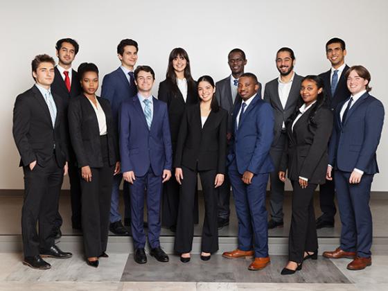A group of students in business attire.