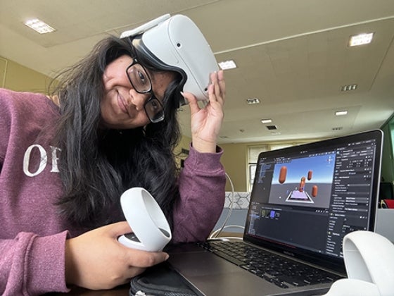 Tanisha wearing VR headset