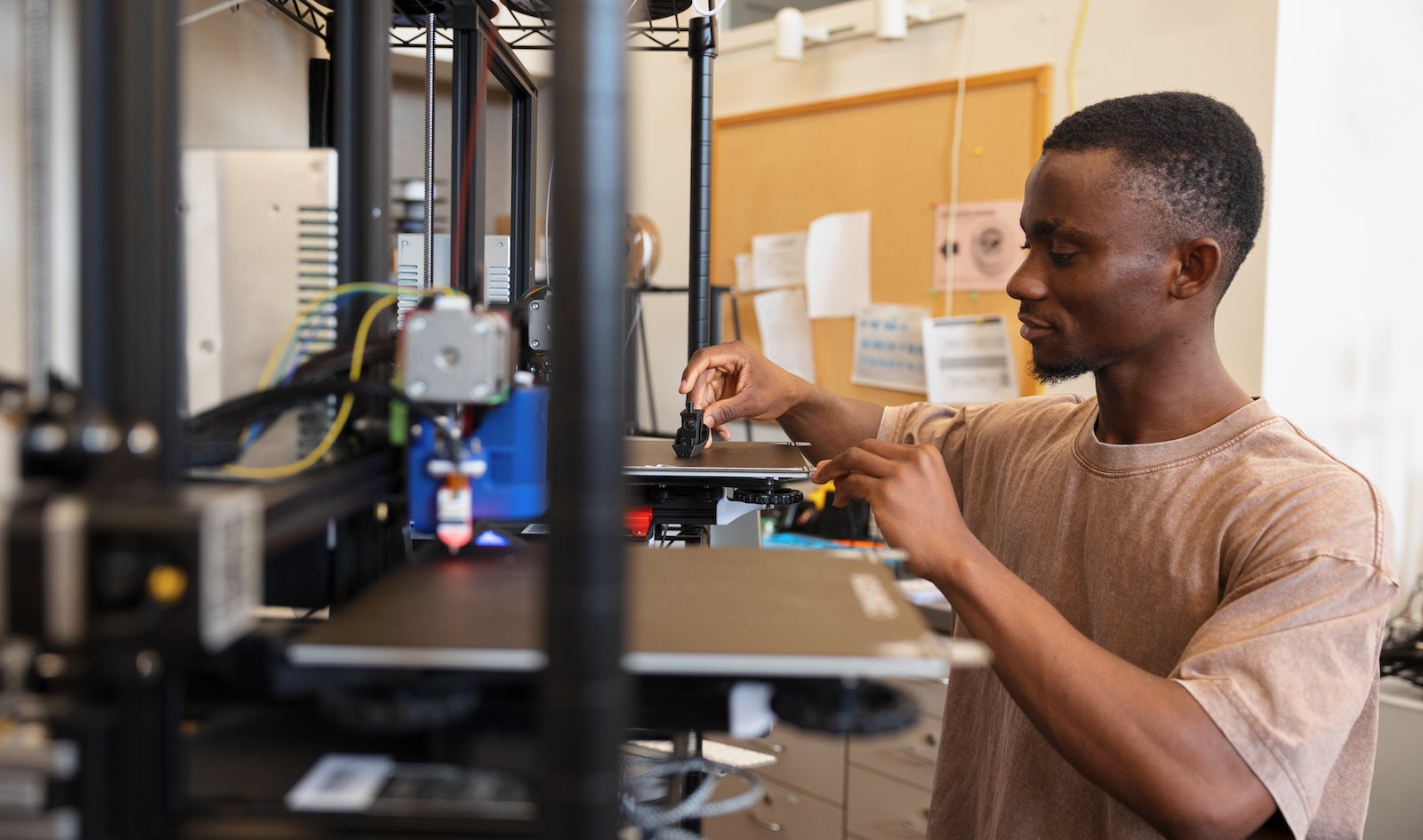 a student looks focused while working in an engineering lab