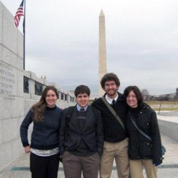 Four people at the Washington monument