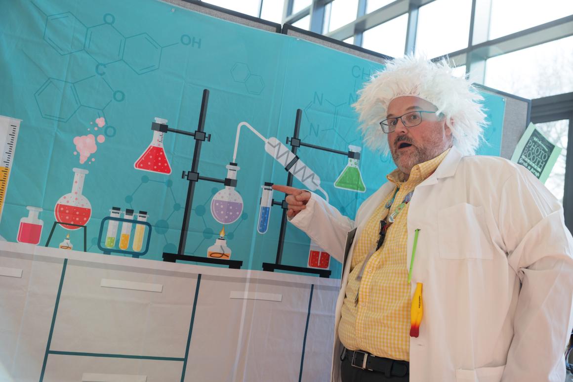 A man dressed up as a mad scientist in the Science Center.