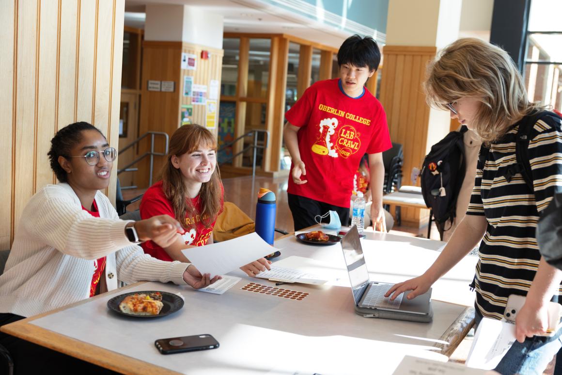 Students registering at a table in the Science Center.